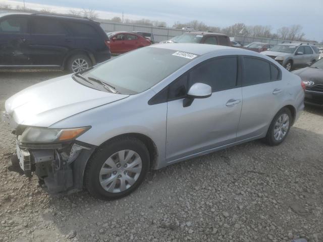 HONDA CIVIC LX 2012 with VIN 2HGFB2F56CH599197 - Photo from auction