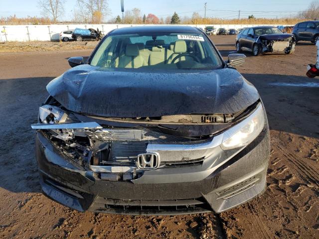 Photo 5 from auction – 2016 HONDA CIVIC LX with VIN 19XFC2F52GE082315