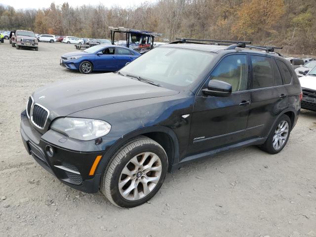 BMW X5 2012 with VIN 5UXZV4C52CL758639 - Photo from auction
