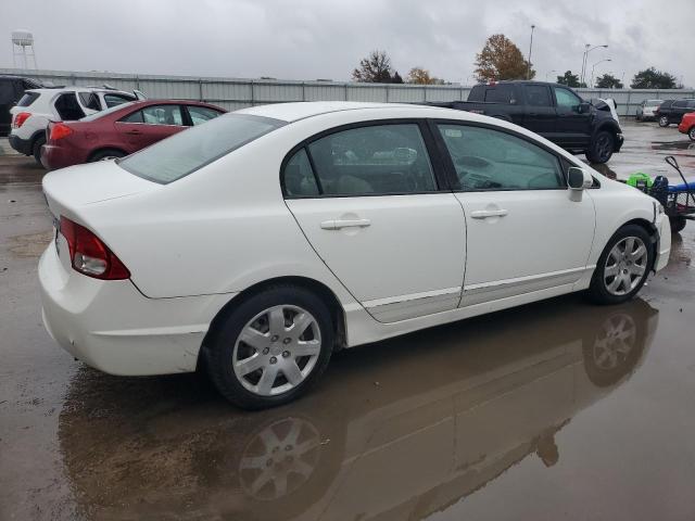 Photo 3 from auction – 2011 HONDA CIVIC LX with VIN 19XFA1F50BE046194