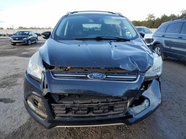 Photo 5 from auction – 2015 FORD ESCAPE TIT with VIN 1FMCU0J98FUB88214
