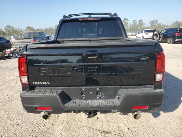 Photo 6 from auction – 2024 HONDA RIDGELINE with VIN 5FPYK3F54RB021974