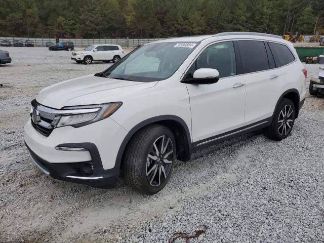 HONDA PILOT ELIT 2022 with VIN 5FNYF6H07NB074730 - Photo from auction