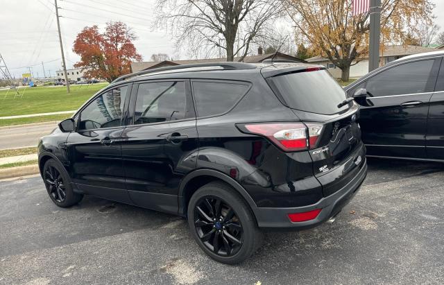 Photo 3 from auction – 2017 FORD ESCAPE TIT with VIN 1FMCU0JD3HUD38821
