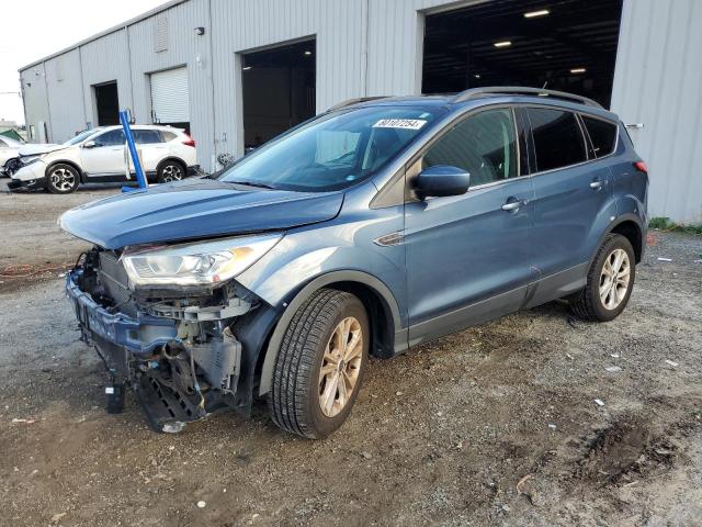 FORD ESCAPE SEL 2018 with VIN 1FMCU9HDXJUA62850 - Photo from auction