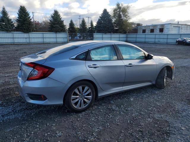 Photo 3 from auction – 2016 HONDA CIVIC LX with VIN 19XFC2F50GE057168
