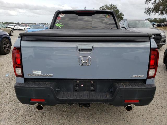 Photo 6 from auction – 2022 HONDA RIDGELINE with VIN 5FPYK3F85NB033667