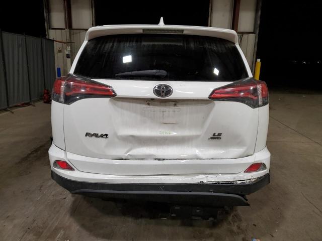 Photo 6 from auction – 2018 TOYOTA RAV4 LE with VIN 2T3BFREV0JW850062