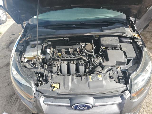 Photo 11 from auction – 2014 FORD FOCUS SE with VIN 1FADP3F2XEL447955