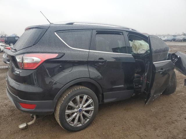 Photo 3 from auction – 2017 FORD ESCAPE TIT with VIN 1FMCU0JD0HUC44914