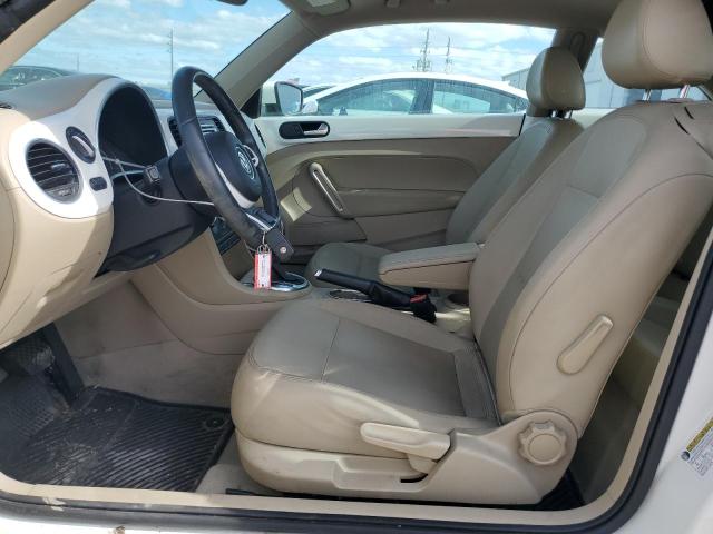 Photo 7 from auction – 2013 VOLKSWAGEN BEETLE with VIN 3VWJP7AT7DM676138