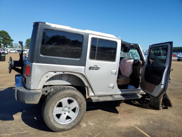 Photo 3 from auction – 2011 JEEP WRANGLER U with VIN 1J4BA5H13BL627321