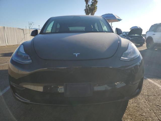 Photo 5 from auction – 2022 TESLA MODEL Y with VIN 7SAYGDEF2NF554039