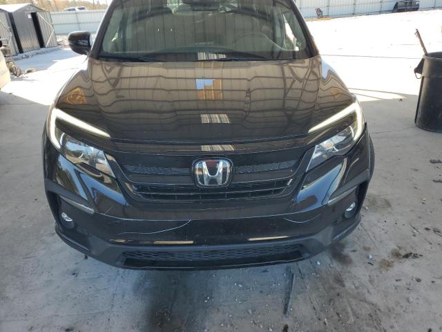 Photo 12 from auction – 2022 HONDA PILOT LX with VIN 5FNYF6H28NB095863