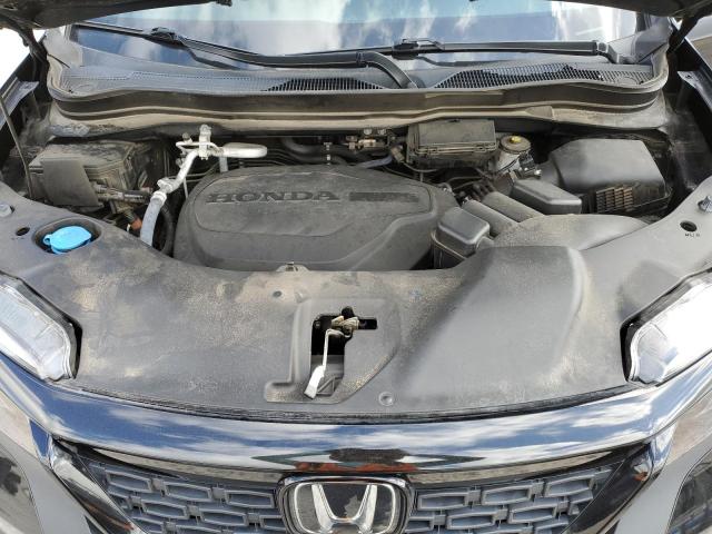 Photo 12 from auction – 2021 HONDA PASSPORT E with VIN 5FNYF7H53MB016100