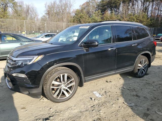 Photo 1 from auction – 2016 HONDA PILOT TOUR with VIN 5FNYF6H92GB052247