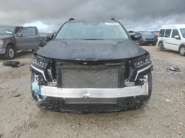 Photo 5 from auction – 2023 KIA SORENTO S with VIN 5XYRLDLC6PG214555