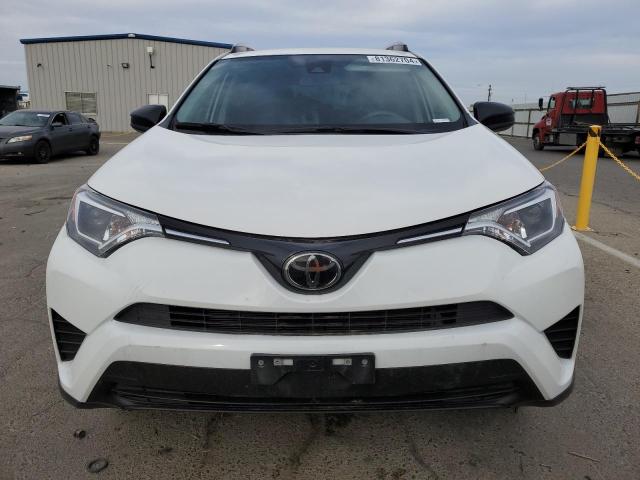 Photo 5 from auction – 2018 TOYOTA RAV4 LE with VIN JTMZFREV2JJ737159