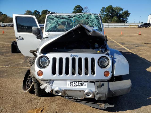Photo 5 from auction – 2011 JEEP WRANGLER U with VIN 1J4BA5H13BL627321