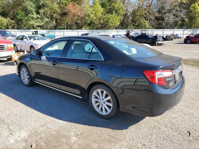 Photo 2 from auction – 2012 TOYOTA CAMRY HYBR with VIN 4T1BD1FK2CU060558