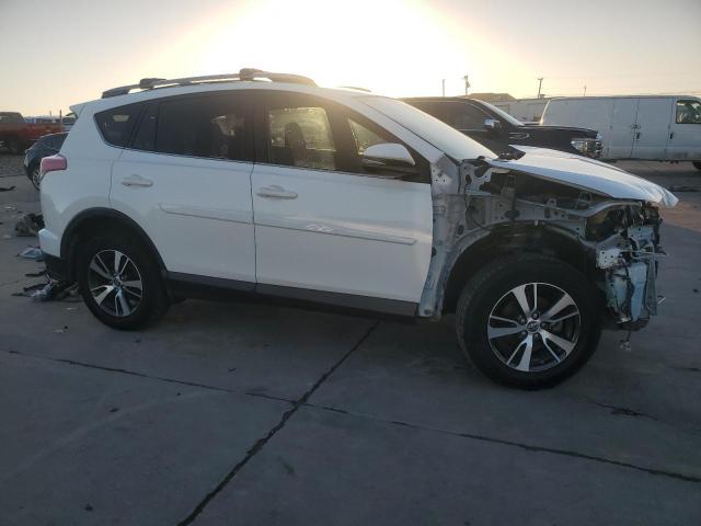 Photo 4 from auction – 2017 TOYOTA RAV4 XLE with VIN JTMWFREV9HJ721764