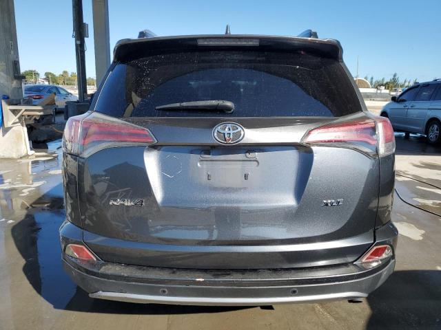Photo 6 from auction – 2017 TOYOTA RAV4 XLE with VIN JTMWFREVXHD098458