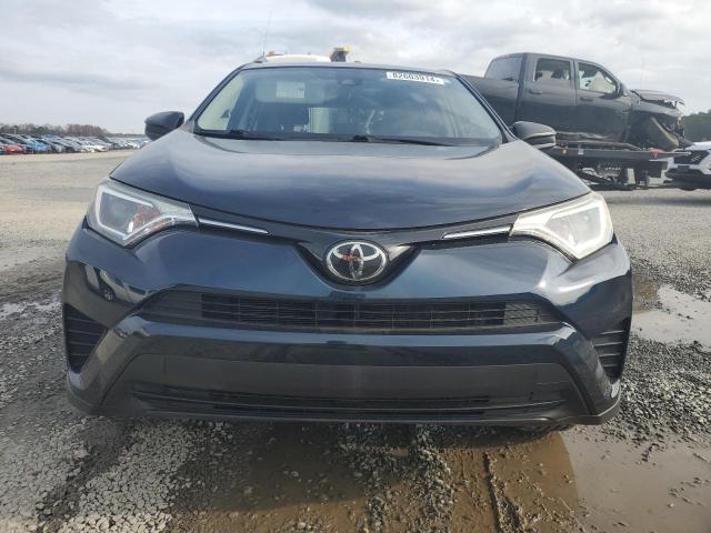 Photo 5 from auction – 2018 TOYOTA RAV4 LE with VIN JTMBFREV9JJ212360