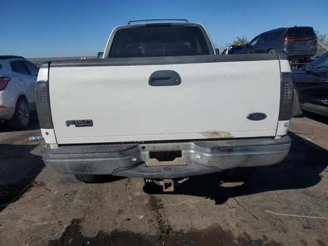 Photo 6 from auction – 1999 FORD F150 with VIN 1FTRX18W1XKB45838