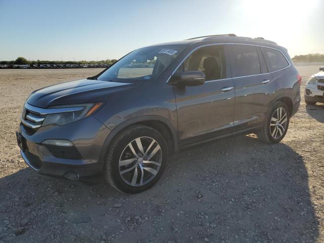 Photo 1 from auction – 2016 HONDA PILOT TOUR with VIN 5FNYF5H92GB054221
