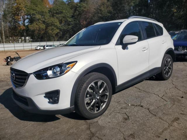MAZDA CX-5 GT 2016 with VIN JM3KE2DY8G0815358 - Photo from auction
