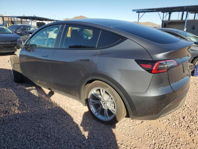 Photo 2 from auction – 2023 TESLA MODEL Y with VIN 7SAYGDED3PF962602