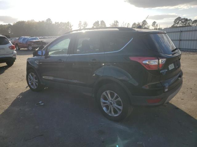 Photo 2 from auction – 2018 FORD ESCAPE SE with VIN 1FMCU9GD1JUC57852