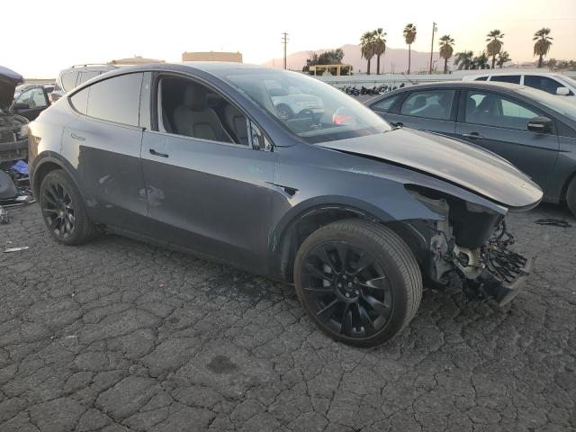 Photo 4 from auction – 2023 TESLA MODEL Y with VIN 7SAYGAEE8PF980052