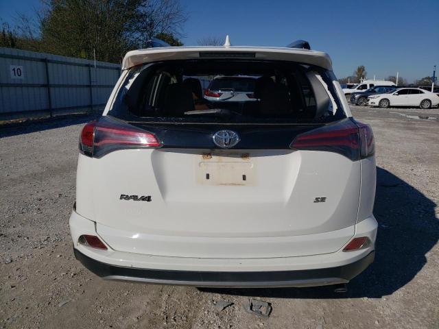 Photo 6 from auction – 2018 TOYOTA RAV4 SE with VIN JTMNFREV2JJ724331