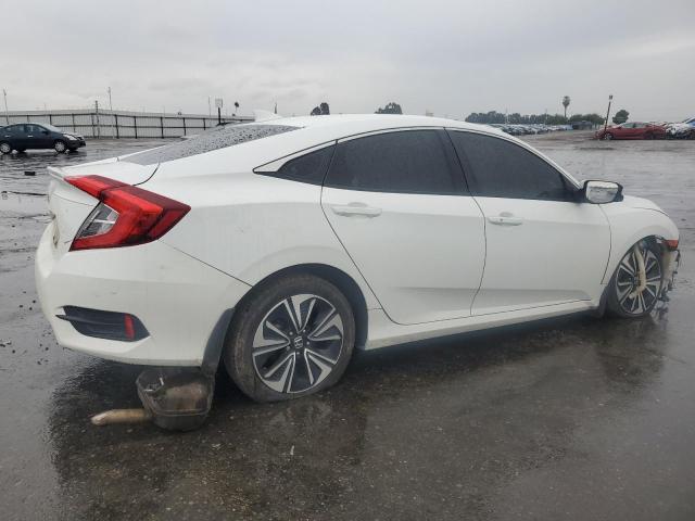 Photo 3 from auction – 2018 HONDA CIVIC EX with VIN 2HGFC1F34JH641577
