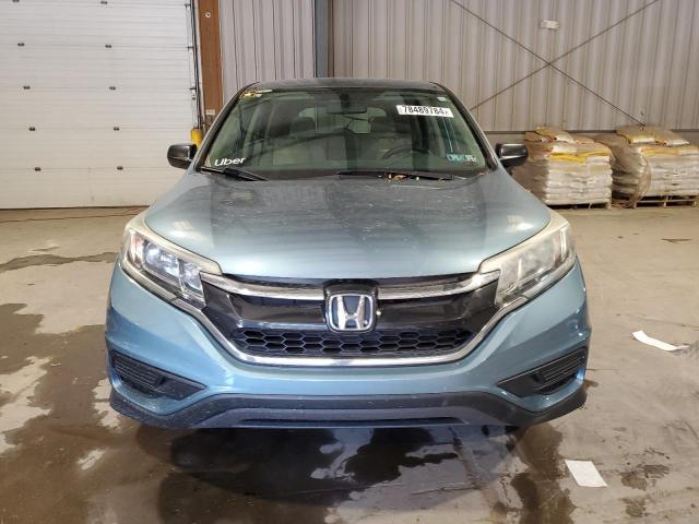 Photo 5 from auction – 2015 HONDA CR-V LX with VIN 2HKRM3H38FH556323