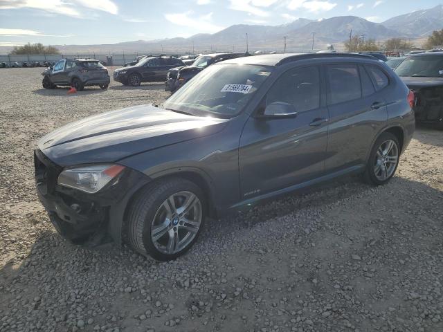 BMW X1 2015 with VIN WBAVM5C5XFVV95009 - Photo from auction