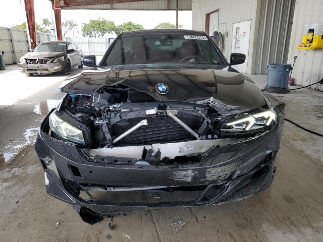 Photo 5 from auction – 2023 BMW 330I with VIN 3MW69FF04P8D71248