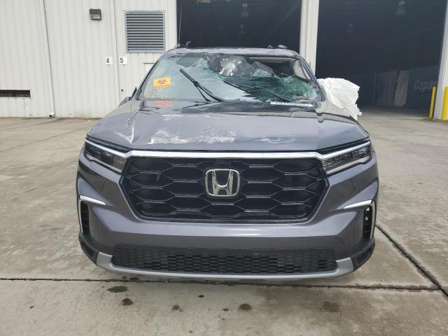 Photo 5 from auction – 2024 HONDA PILOT ELIT with VIN 5FNYG1H81RB004233