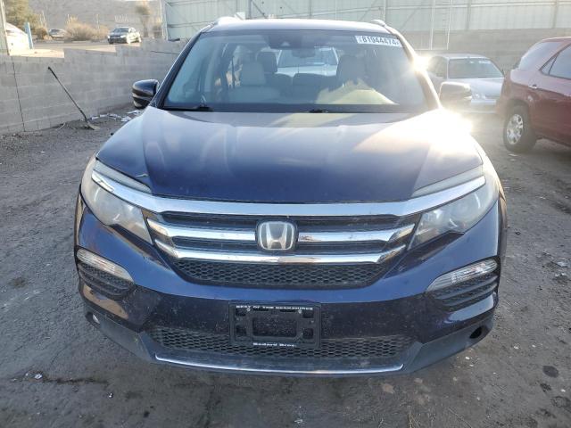 Photo 5 from auction – 2017 HONDA PILOT TOUR with VIN 5FNYF6H94HB041445