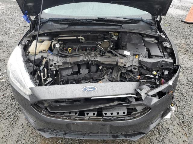 Photo 11 from auction – 2015 FORD FOCUS SE with VIN 1FADP3F27FL214598