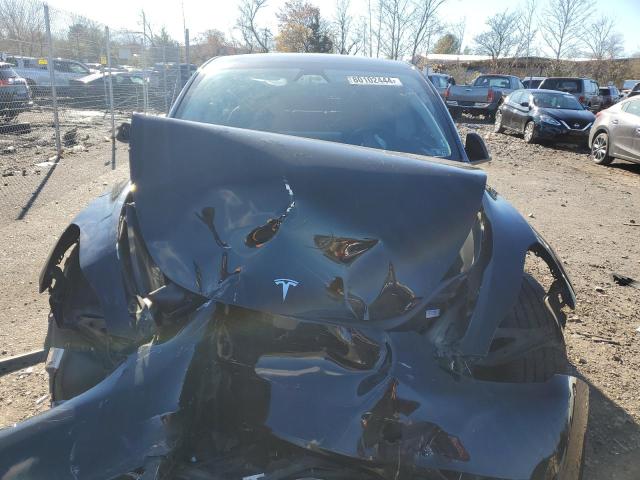 Photo 5 from auction – 2023 TESLA MODEL Y with VIN 7SAYGDEE2PA142744