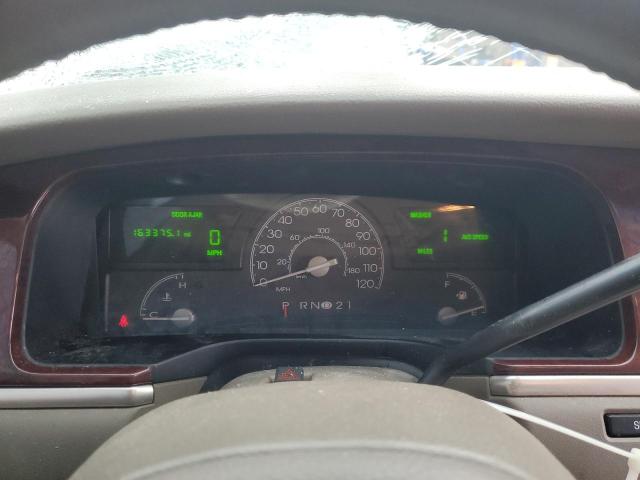 Photo 9 from auction – 2004 LINCOLN TOWN CAR E with VIN 1LNHM81W14Y619797