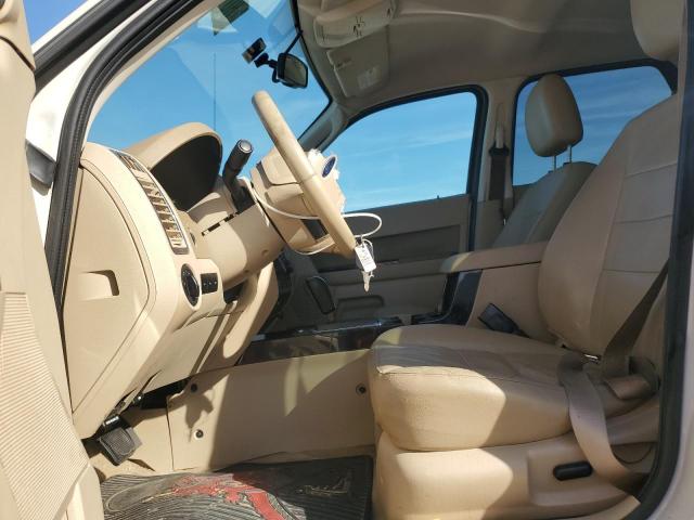 Photo 7 from auction – 2011 FORD ESCAPE LIM with VIN 1FMCU0EG0BKB82440