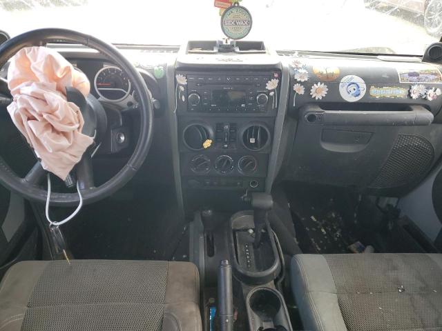 Photo 8 from auction – 2007 JEEP WRANGLER R with VIN 1J4GA69157L154409