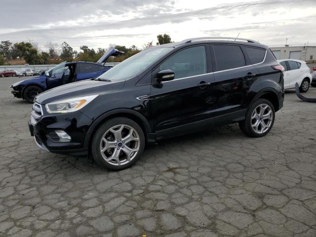 FORD ESCAPE TIT 2017 with VIN 1FMCU0J92HUC51441 - Photo from auction