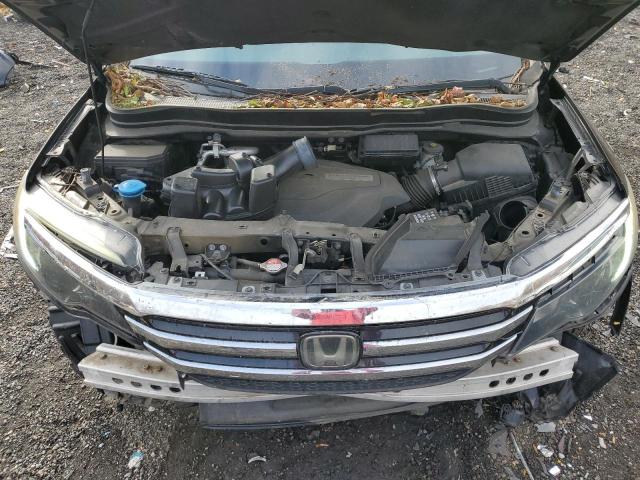 Photo 12 from auction – 2016 HONDA PILOT ELIT with VIN 5FNYF6H05GB041681
