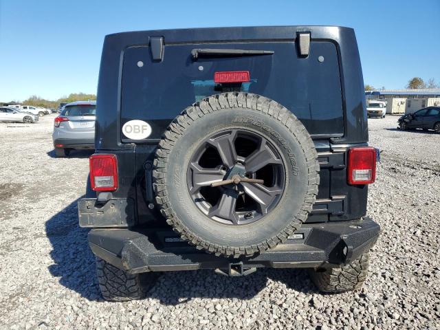 Photo 6 from auction – 2011 JEEP WRANGLER U with VIN 1J4BA5H14BL506670