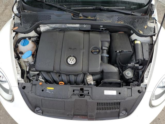 Photo 11 from auction – 2012 VOLKSWAGEN BEETLE with VIN 3VWHP7AT0CM651997