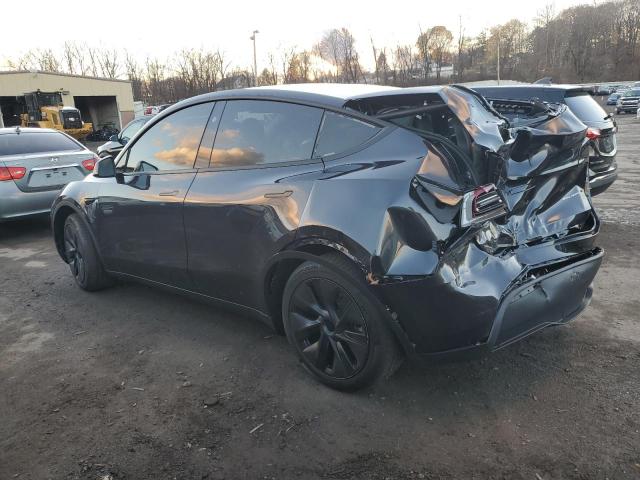 Снимка 2 от търг – 2024 TESLA MODEL Y с VIN 7SAYGAEE4RF207551